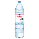 A bottle of Evian - Still Water - 1.5L on a white background.